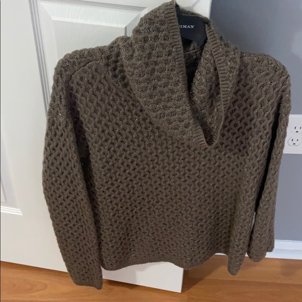Woman’s gray glittered sweater